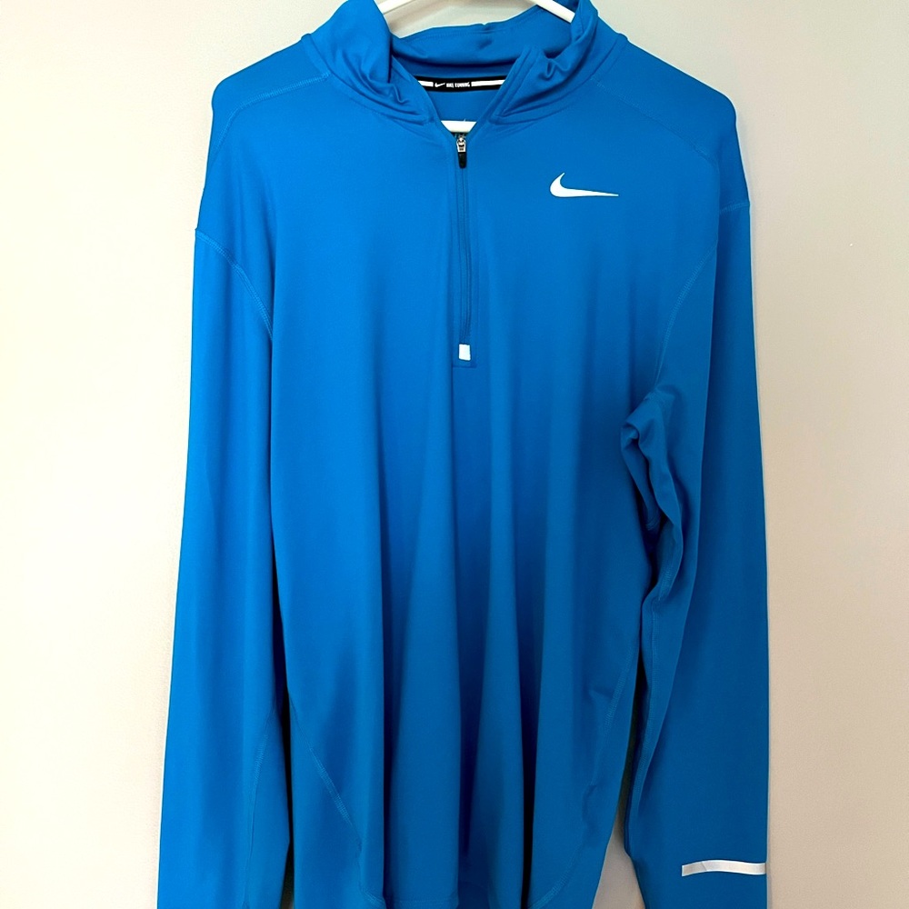 Men’s Nike 1/4 zip running pull over. Size large